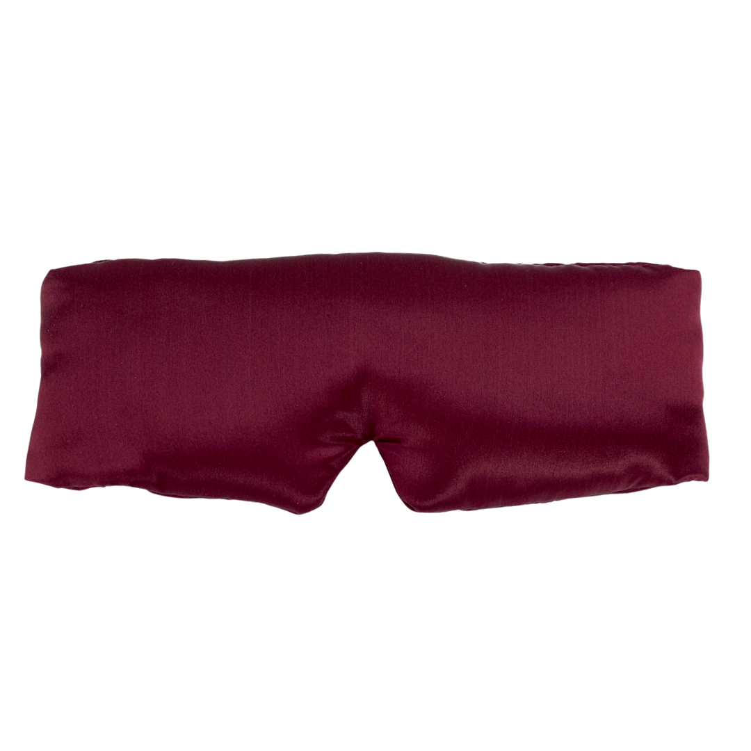 A burgundy pure mulberry silk sleep mask photographed flat against a solid white background.